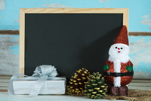 Boże Narodzenie tablica z Santa claus i białe pudełko na gr - Zdjęcie, obraz