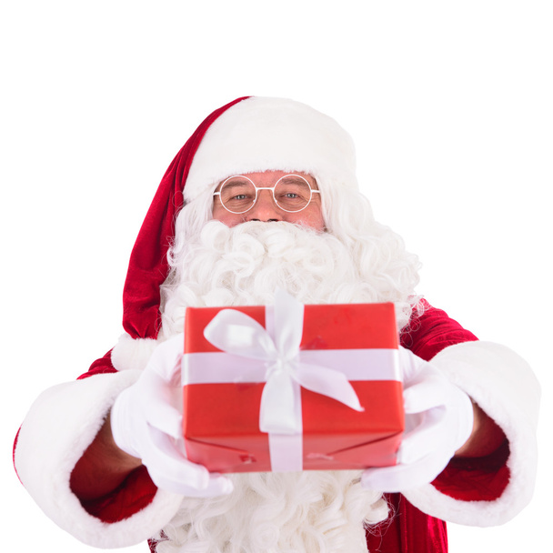 Санта-Клаус с подарочной коробкой - Фото, изображение