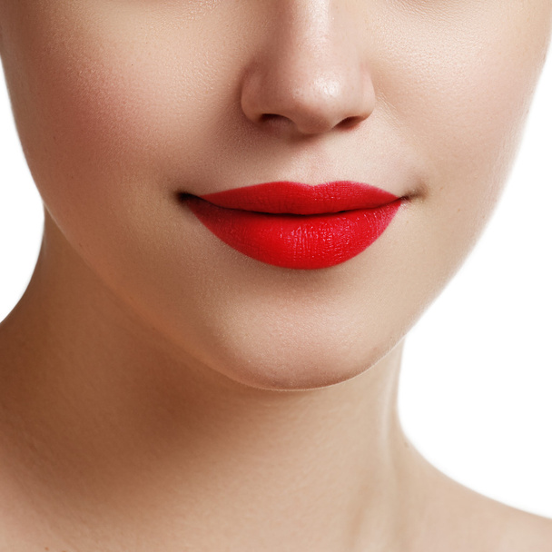 Sexy lips. Beauty red lips makeup detail. Beautiful make-up closeup. Sensual mouth. Lipstick and lipgloss. Beauty model woman's face close-up - 写真・画像