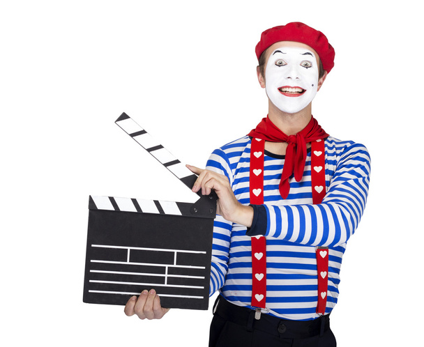 Emotional funny mime actor wearing sailor suit, red beret posing on white background. - Zdjęcie, obraz