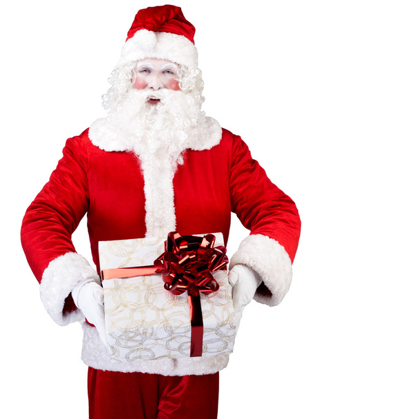 Santa Claus with gift posing on white isolated background - Photo, image