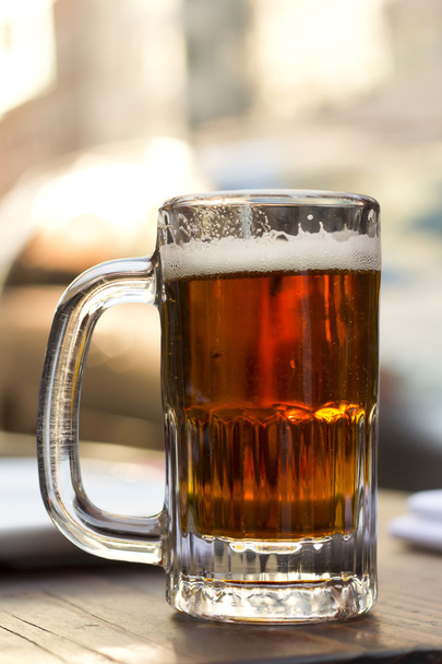Холодная кружка пива IPA
 - Фото, изображение