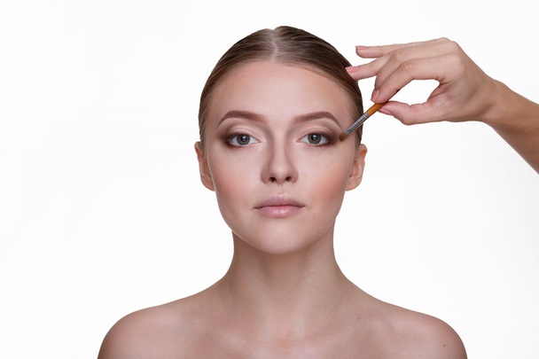 Proceso de maquillaje para la mujer hermosa
 - Foto, Imagen