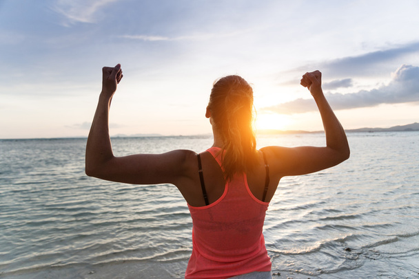 Motivated woman enjoying freedom and exercising success - Foto, Imagem