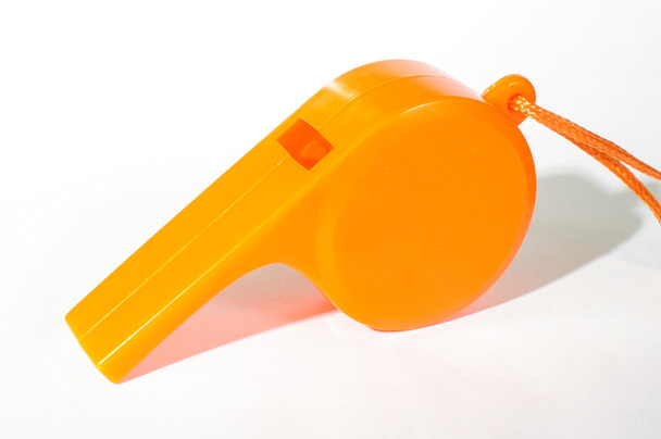 Orange whistle isolated on the white background - Photo, Image