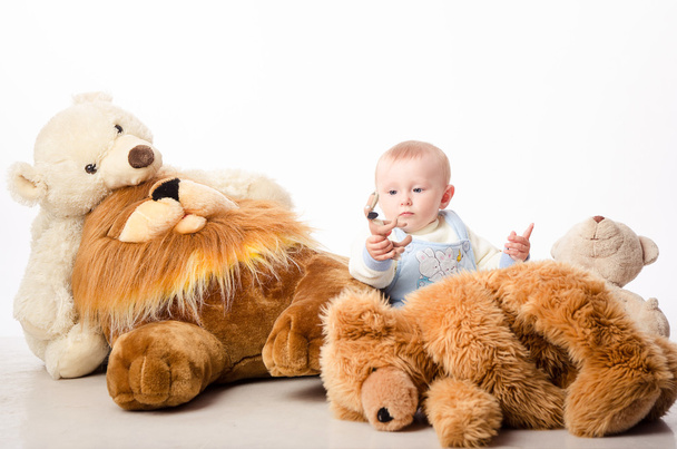 The baby and teddy Bear - Фото, изображение