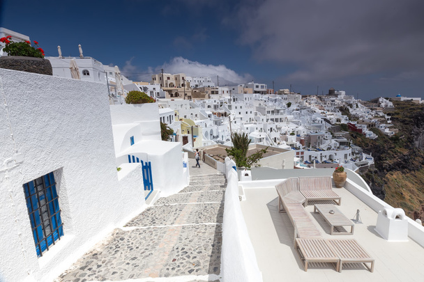 View of Oia traditional white houses and old castle of Oia, Sant - Fotografie, Obrázek