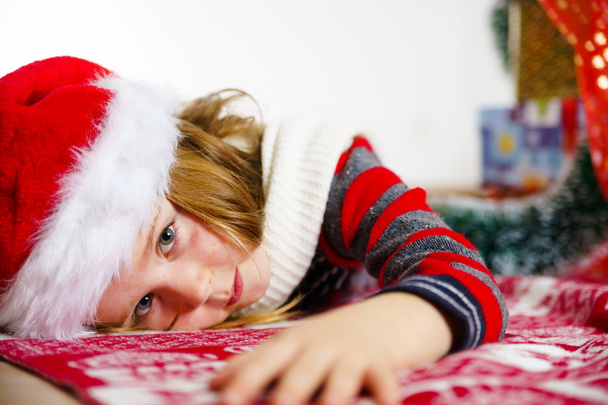Cute little girl in red santa hat christmas portrait - Fotografie, Obrázek