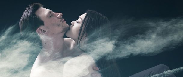 Double exposure of lovers cuddling and cloudscape letterbox - Фото, изображение