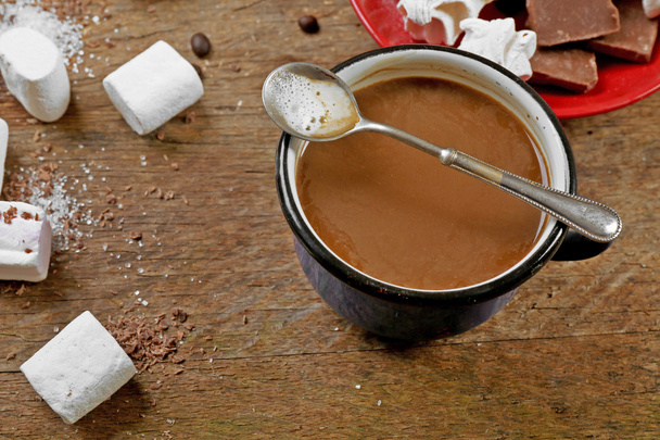 Cup of coffee with sweets on wooden background - Valokuva, kuva