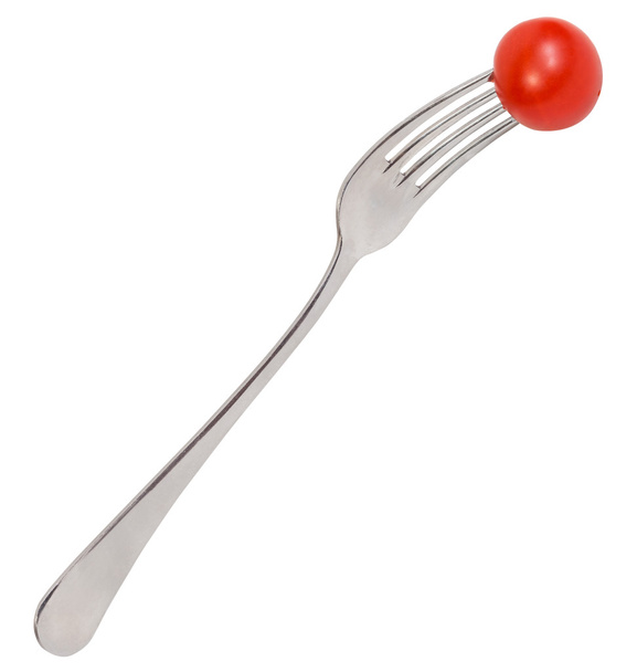 столовая вилка с одним свежим красным помидором черри
 - Фото, изображение