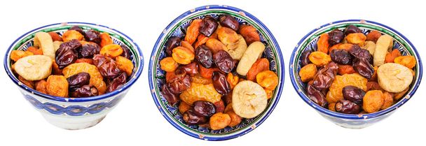 set of traditional ceramic bowls with dried fruits - Photo, Image
