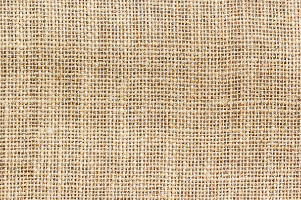 Burlap fabric patch, brown sack cloth, close up detail of natural material  fabric texture for the background Stock Photo