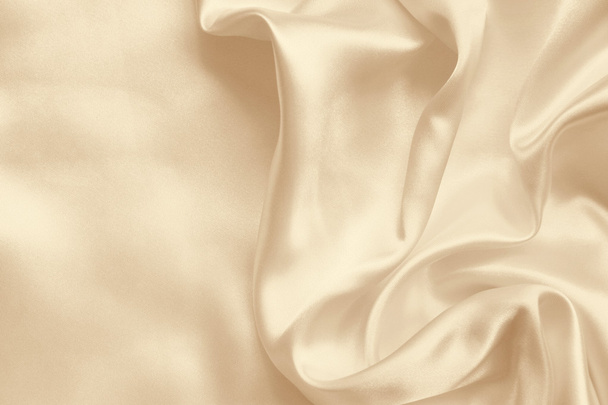 Smooth elegant golden silk as background. In Sepia toned - Фото, зображення