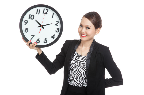 Young Asian business woman with a clock - Zdjęcie, obraz