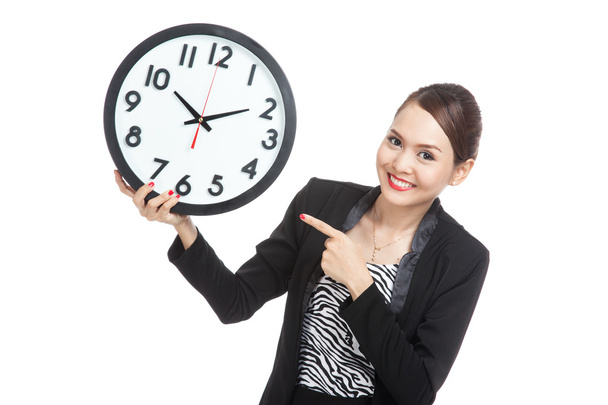 Young Asian business woman point to a clock - Foto, Imagem