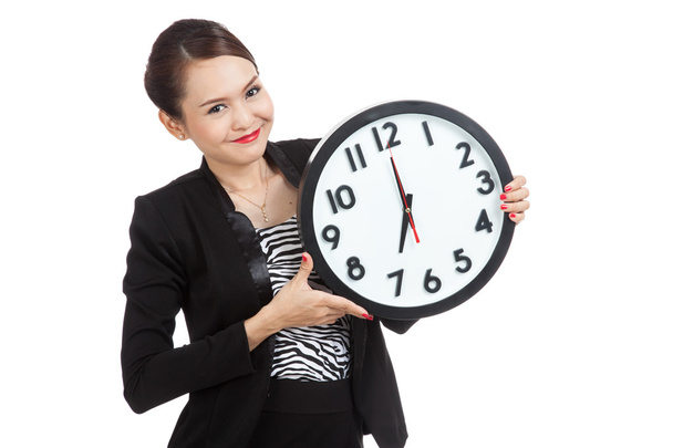 Young Asian business woman with a clock - Photo, image