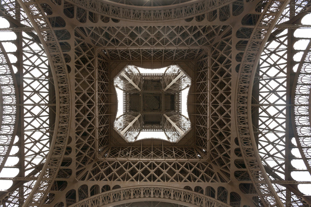 Eiffel tower viewed from underneath - Photo, Image