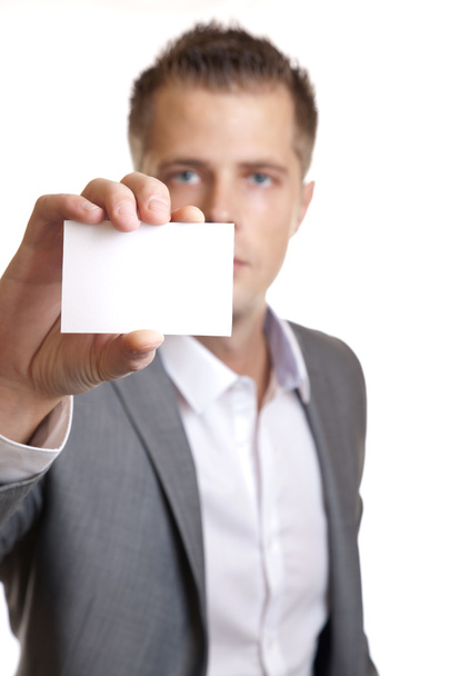Businessman showing an empty business card - Foto, Imagen