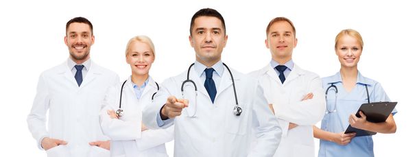 group of doctors with clipboard pointing at you - Φωτογραφία, εικόνα