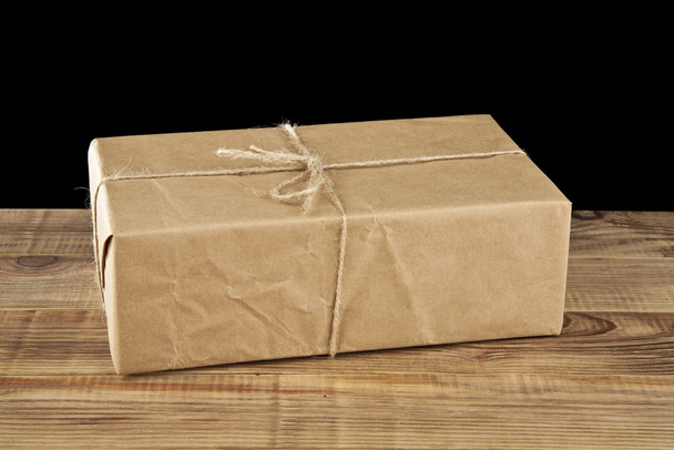 Post parcel on table
 - Фото, изображение