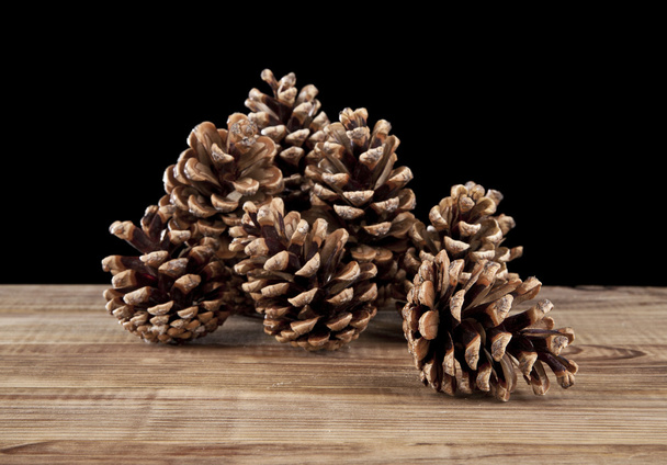 cones on wooden table - Foto, imagen