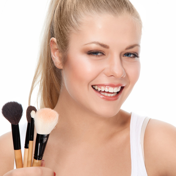 Beauty portrait with brushes - Foto, imagen