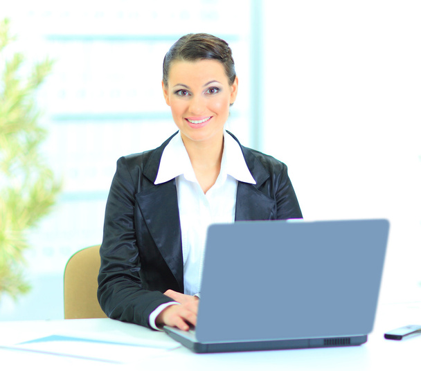 Beautiful businesswoman for work with the laptop in the office. - Foto, immagini
