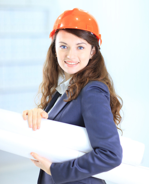 Beautiful businesswoman engineer with the work-plan office. - Photo, image