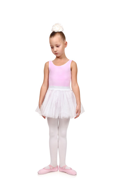 dances ballet kid in her ballerina tutu, isolated on white - Fotó, kép