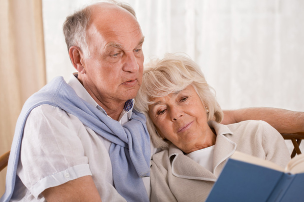 Senior couple reading together - 写真・画像