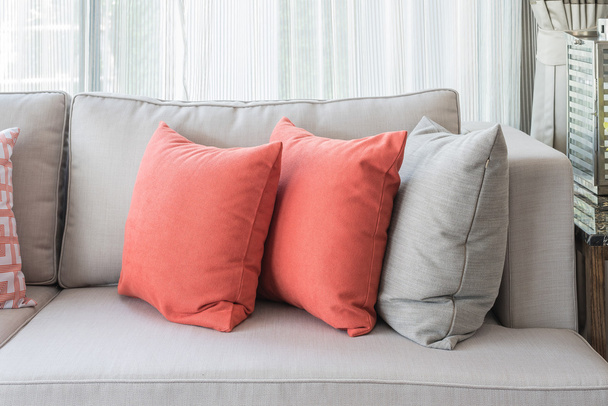 row of pillows on sofa in classic living room style - Foto, Bild