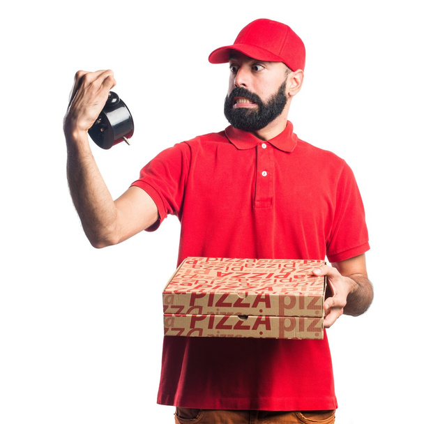 Pizza repartidor hombre celebración de reloj vintage
 - Foto, imagen