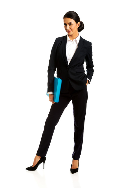Businesswoman holding a binder - Zdjęcie, obraz