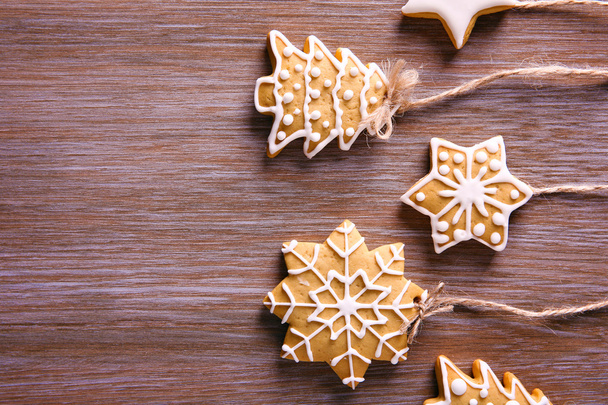 Christmas cookies on wooden table - Fotoğraf, Görsel