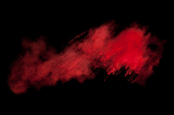 Freeze motion of red dust explosion on black background - Φωτογραφία, εικόνα