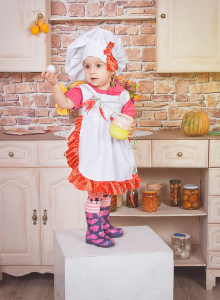 Cute little girl in the kitchen - Photo, Image