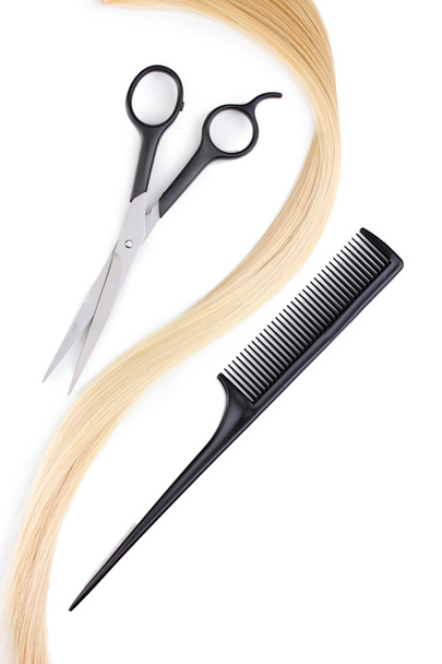 Shiny blond hair with hair cutting shears and comb isolated on white - Zdjęcie, obraz