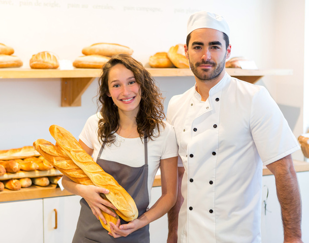 Team of bakers working at the bakery - Foto, Imagem