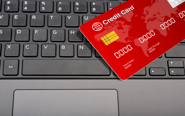 Cartão de crédito em teclas de teclado vista close-up
 - Foto, Imagem