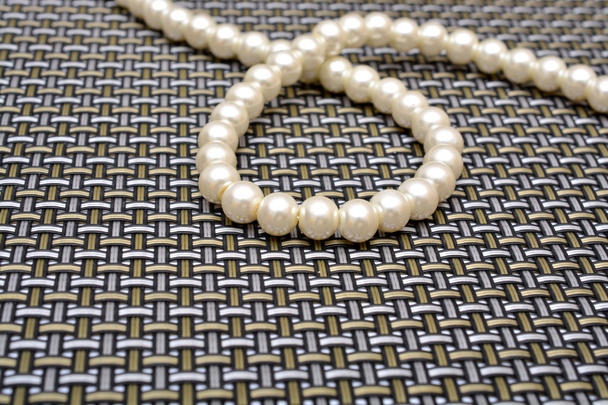 Pearl silver on pattern background - Φωτογραφία, εικόνα