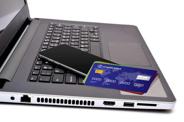 Tarjetas de crédito y smartphone con teclas de teclado
 - Foto, imagen