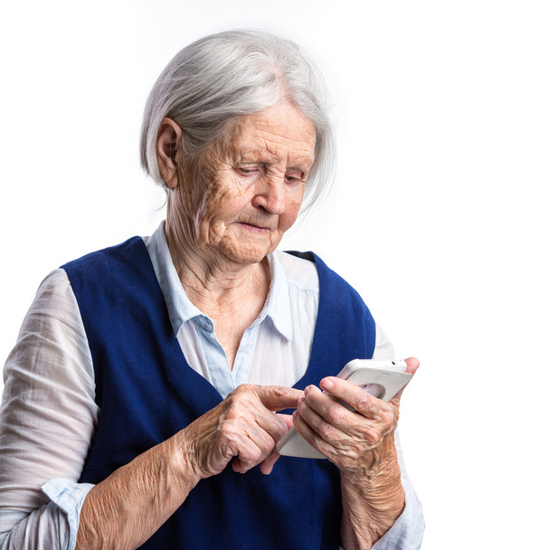 Senior woman using smartphone - 写真・画像