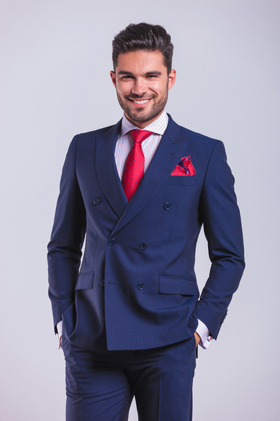 business man smiling and posing with hands in pockets  - Photo, Image
