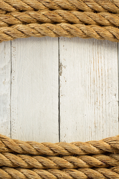 Corde de bateau sur bois
 - Photo, image