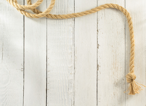 ship rope on wood - Foto, afbeelding