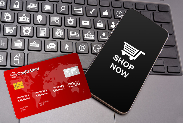 Iconos de compras en teclas de teclado con teléfono inteligente y tarjeta de crédito
 - Foto, imagen