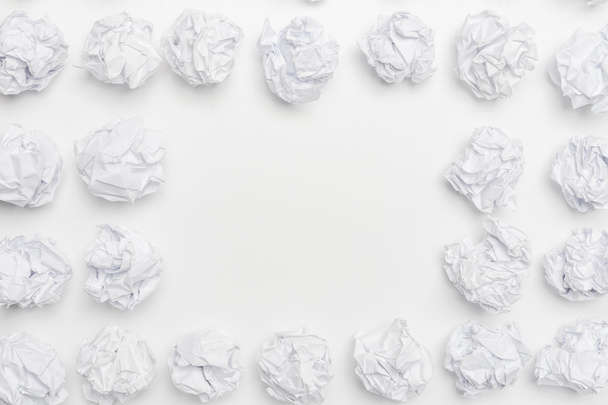 crumpled paper on white table - Фото, зображення