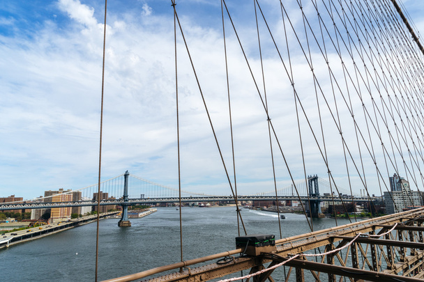 View of Manhattan bridge from Brooklyn Bridge in New York. - Fotoğraf, Görsel