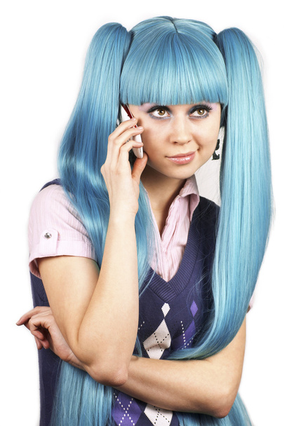 Pretty woman with blue hair talking on mobile phone - Foto, Imagem